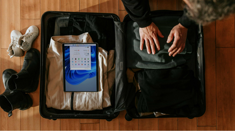 Open suitcase while someone is packing it. 