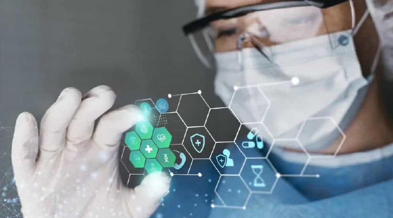 Medical professional interacting with digital interface displaying cannabinoid-related icons, representing advanced cannabis science and technology.